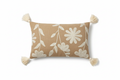 Sandy beige daisy floral lumbar cushion cover with corner tassels — flat lay on white background