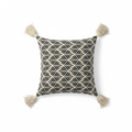 Ivory black geometric chevron square cushion cover with corner tassels — flat lay on white background
